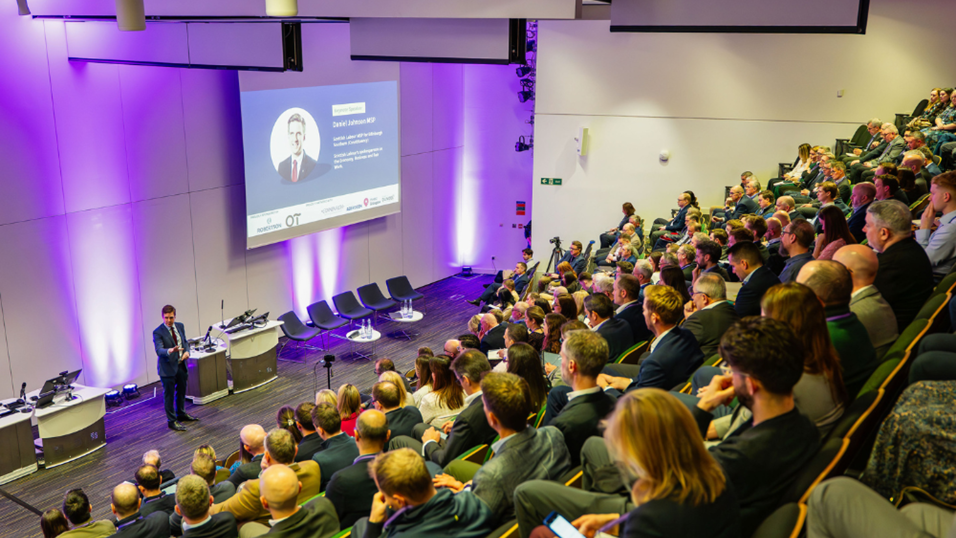People sitting in terraced seats at a BPF Group Annual Conference